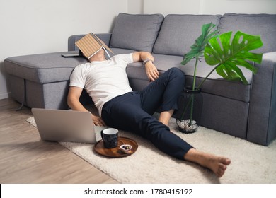 Young Asian Man Sleeping And Laying On Floor After Hard Working And Video Conferencing.  Work From Home Concept. Bangkok, Thailand