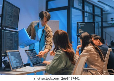 Young Asian man software developers mentor leader manager Verification and validation in software testing ensure developers drive the development of engineering technologies Programmer development
