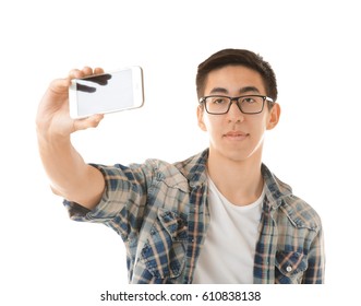 Young Asian Man Taking Selfie On White Background