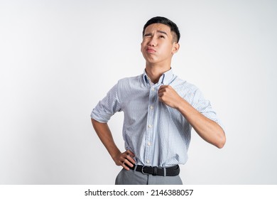 young asian man with tshirt feeling hot weather - Shutterstock ID 2146388057