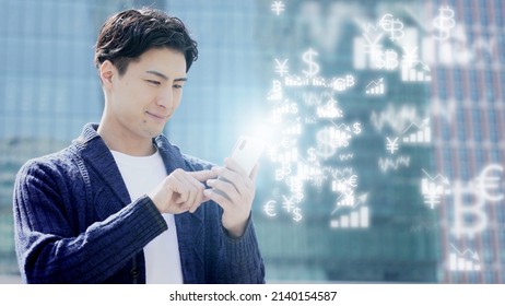 Young Asian Man Using Smart Phone Online Trading 