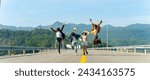 Young Asian man and woman enjoy and fun outdoor lifestyle road trip countryside travel nature on summer holiday vacation. Happy generation z people friends walking together on the road in sunny day.