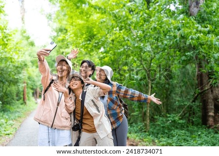 Similar – Image, Stock Photo Young woman vlogging outdoors with a mobile gimbal