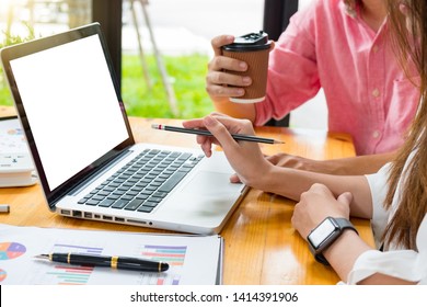 Young Asian Man And Woman At Office Of Their Business Online Shopping,In Home Office,Start Up Small Business Entrepreneur SME.
