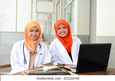 Young Asian Medical Student Woman In Head Scarf Smile