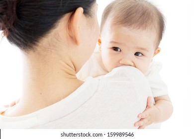 Young Asian Mother And Baby In The Room