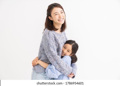 Young Asian Mother And Daughter