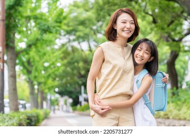 young asian mother and daughter , School bag - Shutterstock ID 2205731277