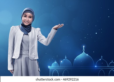 Young Asian Muslim Woman Give Smile On Mosque Background With Blue Color, Template Your Giftcard