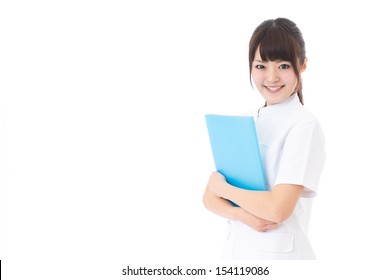 Young Asian Nurse On White Background