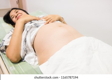 Young Asian Pregnant Woman Preparing Herself For Giving Birth In Hospital, New Life Of Abortion Concep