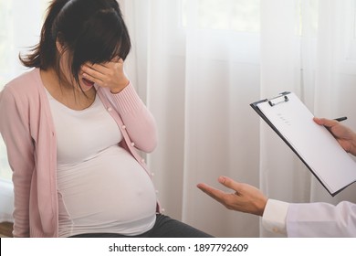 Young asian pregnant women have psychologist consultation at hospital or clinic,from panic and worried pregnancy condition, expecting family.Which must be treated with therapy before the baby is born.