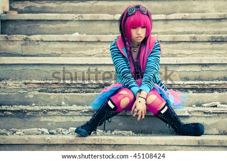 Young asian sad girl with cosplay looking.