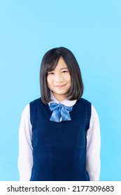 Young Asian Schoolgirl With School Uniform. Junior High School Student.