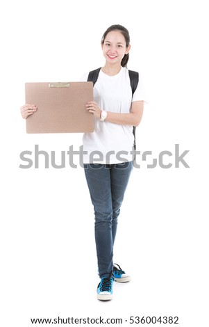 Young Asian showing blank empty billboard poster sign. Isolated on white background.