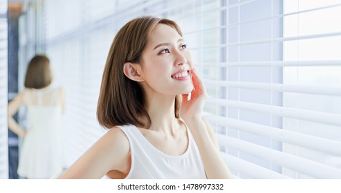 Young asian skin care woman enjoy the sunshine and not afraid of suntan