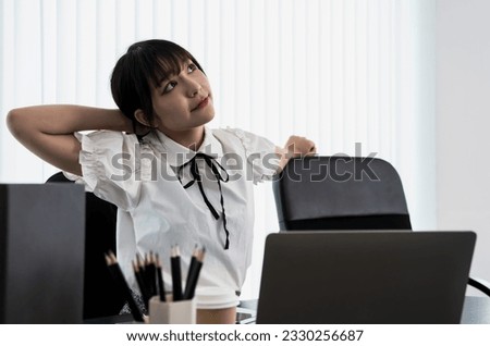 Young Asian startup woman sitting in office thinking about new business project, young net idol woman creating new contents online in socialmedia channel, female blogger think next life streaming work
