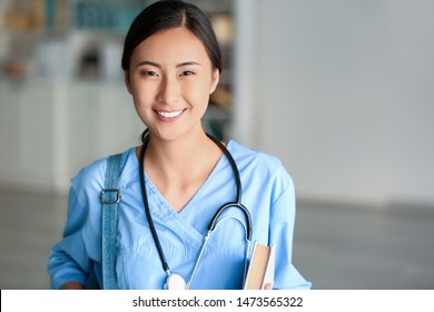 Young Asian student in clinic
