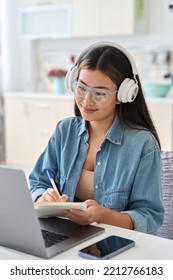 Young Asian Student Studying Online Watching Education Webinar On Laptop From Home. Digital Online Course Development Program In Quarantine Social Distance Or Upskill School Class For Career Path