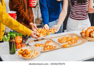 
Young Asian students gather with friends for a pizza party, laughing and sharing slices. Enjoying fast food delivery, they embody diversity and togetherness in a relaxed, enjoyable lifestyle. - Powered by Shutterstock