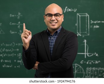 Young Asian Teacher Man Teaching Video Conference With Student. Male Indian Teacher Training The Mathematics In Classroom From Online Course.