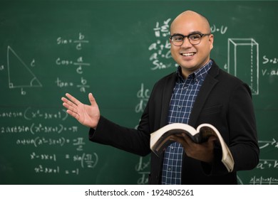 Young Asian Teacher Man Teaching Video Conference With Student. Male Indian Teacher Training The Mathematics In Classroom From Online Course.