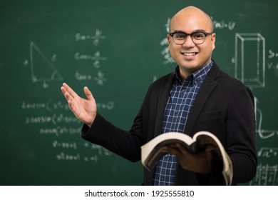 Young Asian Teacher Man Teaching Video Conference With Student. Male Indian Teacher Training The Mathematics In Classroom From Online Course.