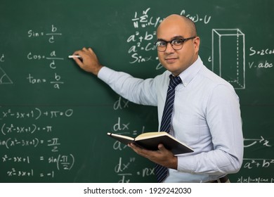 Young Asian Teacher Man Teaching Video Conference With Student. Male Indian Teacher Training The Mathematics In Classroom From Online Course.