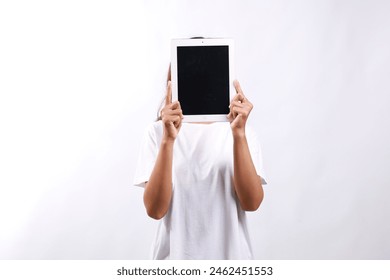 Young asian woman in casual holding Digital Tablet Face Covered Copy Space Technology Concept - Powered by Shutterstock