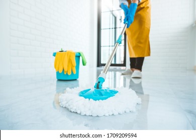 Young Asian Woman Cleaning House Sweeping The Floor With A Mop House Keeping Concept