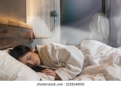 Young asian woman dreaming and soul leaves her body during sleeping at night Beautiful girl get unconscious during sleep She get tired exhausted Death Syndrome or Heart Attrack and Health Care Concept - Shutterstock ID 2218140035