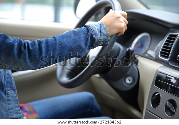  young asian woman\
driver driving car