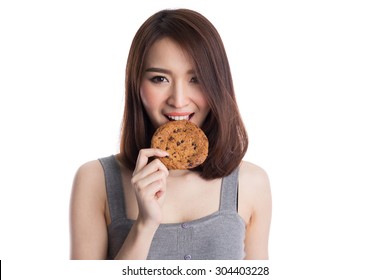 Young Asian Woman Eating Chocolate Chip Cookies, Isolated On White Background.