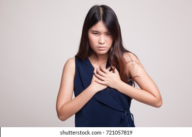 Young Asian Woman Got Chest Pain On Gray Background