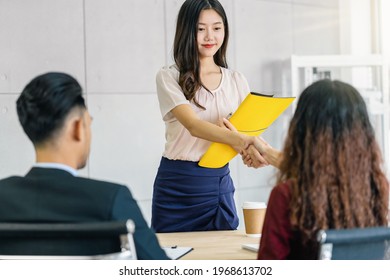 Young Asian Woman Graduate Hand Shake With Two Manager To Welcome Before Start To Job Interview With Positive Motion In Meeting Room,Business Hiring New Member,Job Interview First Impressions Concept