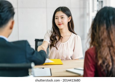 Young Asian Woman Graduate Hand Shake With Two Manager To Welcome Before Start To Job Interview With Positive Motion In Meeting Room,Business Hiring New Member,Job Interview First Impressions Concept