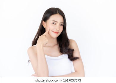 Young Asian Woman Has Smiling Face And Bright Skin Tone.Asian Woman Standing With Isolated White Background.