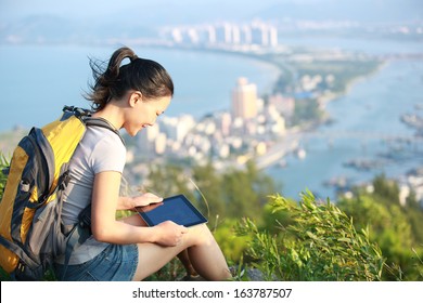 Young Asian Woman Hiker Use Digital Tablet Seaside Mountain Peak 