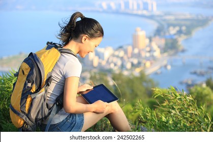 Young Asian Woman Hiker Use Digital Tablet Seaside Mountain Peak 