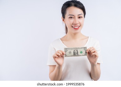 Young Asian Woman Holding Money On Hand