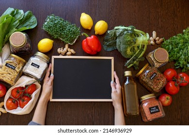 Young Asian Woman Holding School Black Board For Inscription. Vegetarian People. Zero Waste. Diverse Girl