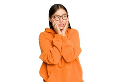 Young Asian Woman Isolated On Green Chroma Background Scared And Afraid.