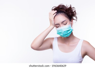 Young Asian Woman In Medical Face Mask She Infect Omicron Virus Beautiful Girl Get Headache And Concerned About Viral Pandemic Illness, Paranoid Pandemic Of Covid 19 Person Get Dizzy And Sickness