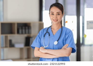 Young Asian woman nurse in clinic - Powered by Shutterstock