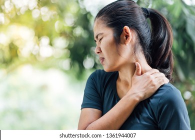 Young Asian Woman With Pain In Shoulder , Ache In Human Body , Health Care Concept