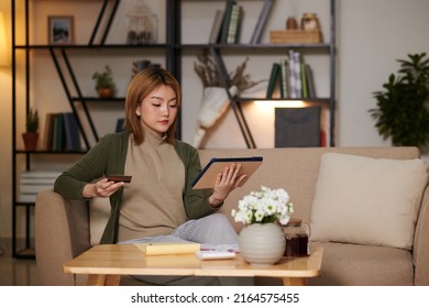 Young Asian Woman Paying Credit Card Bill And Utility Bills Online On Application