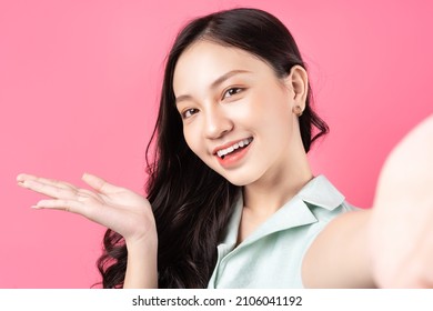 Young Asian Woman Posing For Selfie	