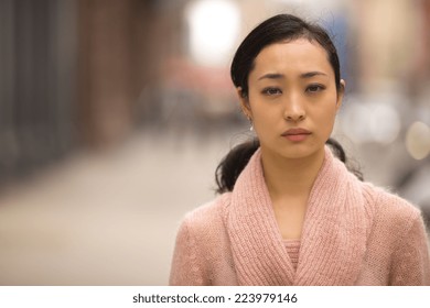 Young Asian Woman Sad Face Portrait