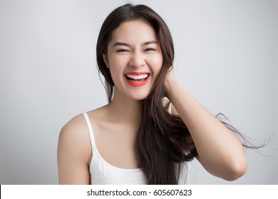 Young Asian Woman With Smiley Face Wearing Glasses Isolated On White Background.