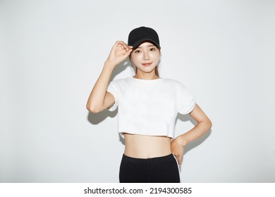 Young Asian Woman In Sporty Fashion